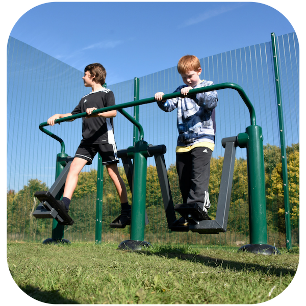 Children using dual sky stepper outdoor gym equipment for kids